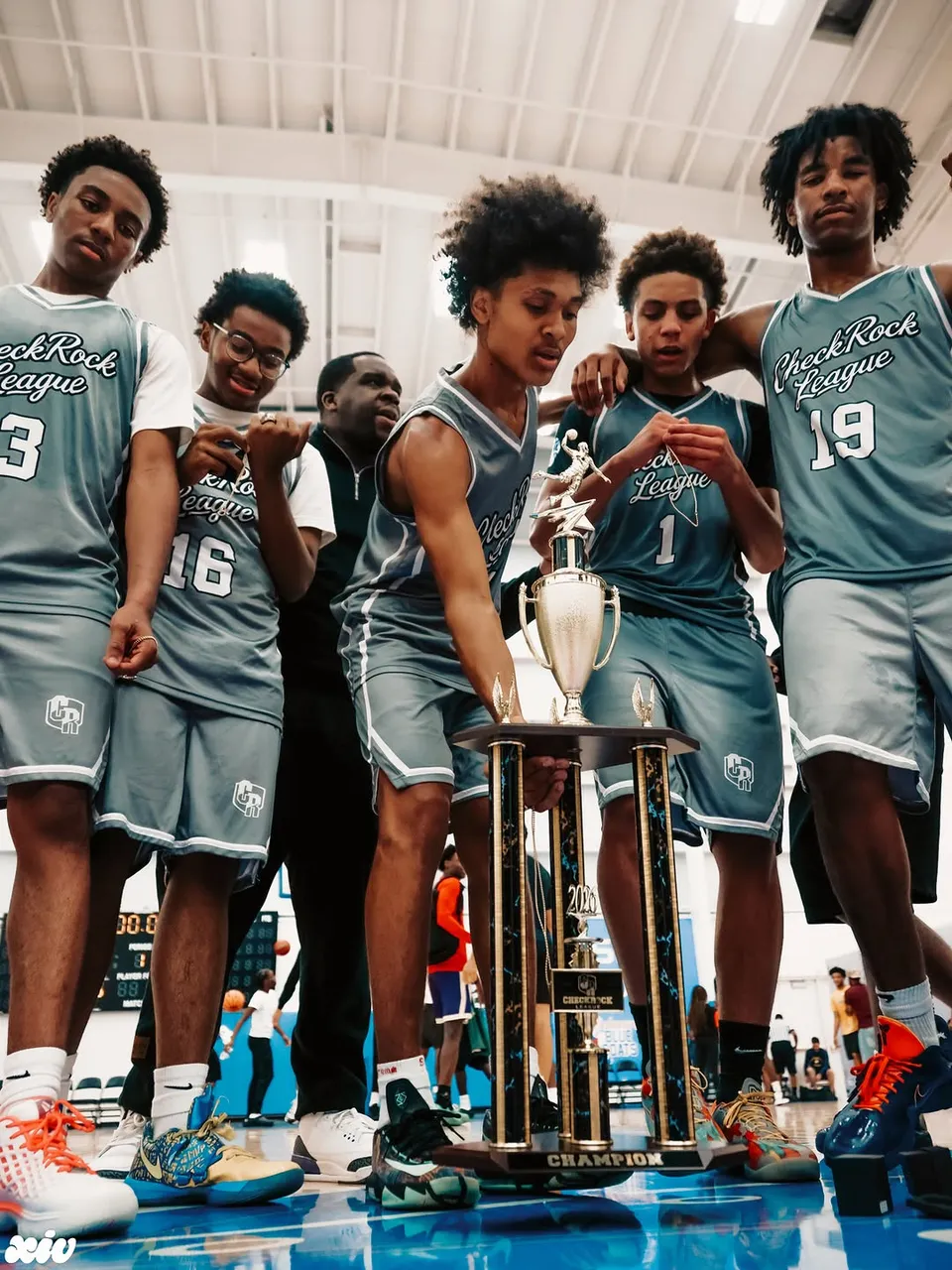 2026 champions with the trophy